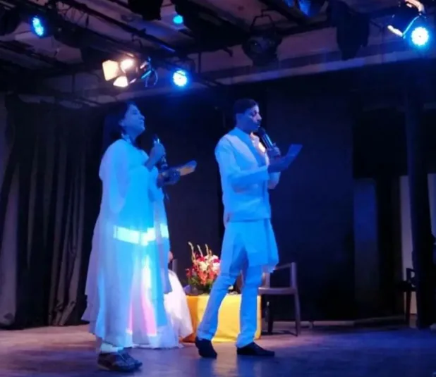 Festival anchors hosting an evening session on stage